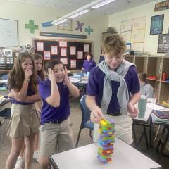 5th Grade Plays Jenga to Review Dividing Fractions